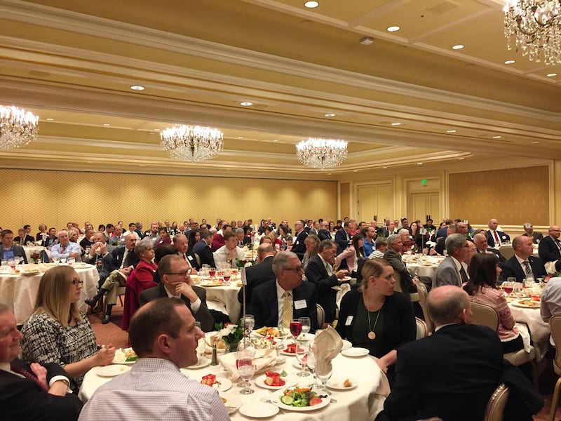 The crowd at the BYU Management Society devotional on Dec. 11 listens as Elder LeGrand R. Curtis speaks at the Little America Hotel in Salt Lake.