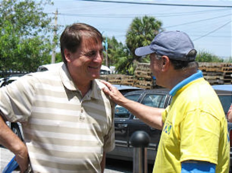 Ft. Lauderdale Mayor, Jack Seiler, and Elder Anthony M. Burns, an Area Seventy, discuss the voluntee