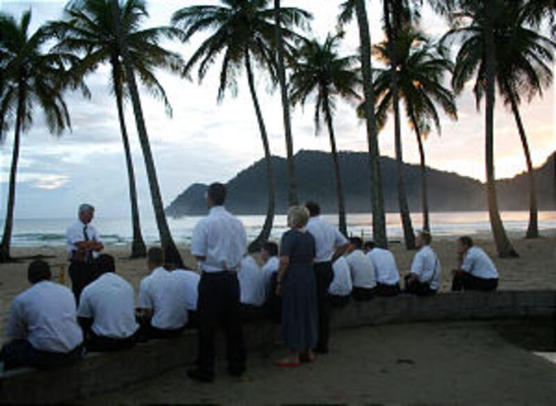 In this shot, I was teaching the elders on Maracas Beach in Trinidad at sunrise. Elder and Sister M