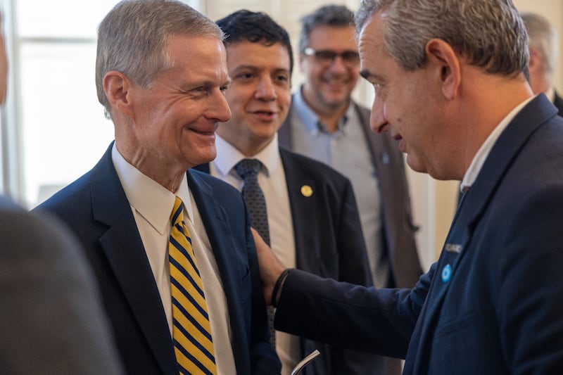 Elder David A. Bednar of the Quorum of the Twelve Apostles, left, speaks with Mayor Pablo Javkin at the Municipal Palace in Rosario, Argentina, on May 20, 2026.