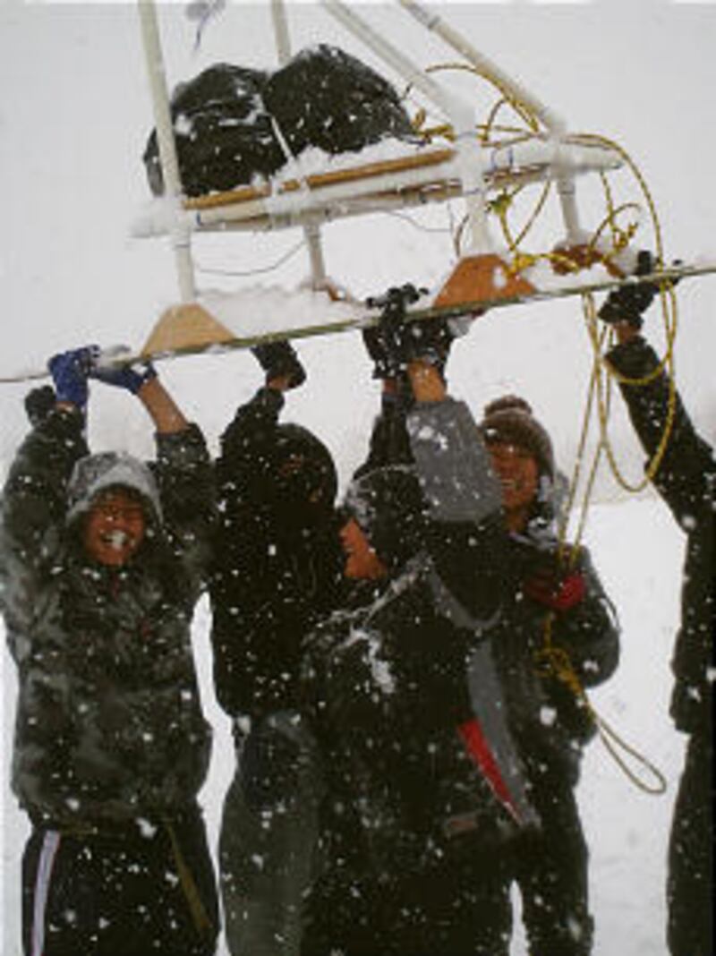 Boy Scouts from Troop 1262 enjoy a triumphant moment together at the Scouting Klondike derby last wi