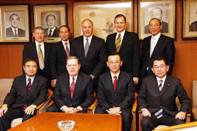 Elder Jeffrey R. Holland, in front second from the left, is shown with, from left to right, Mr. Tosh