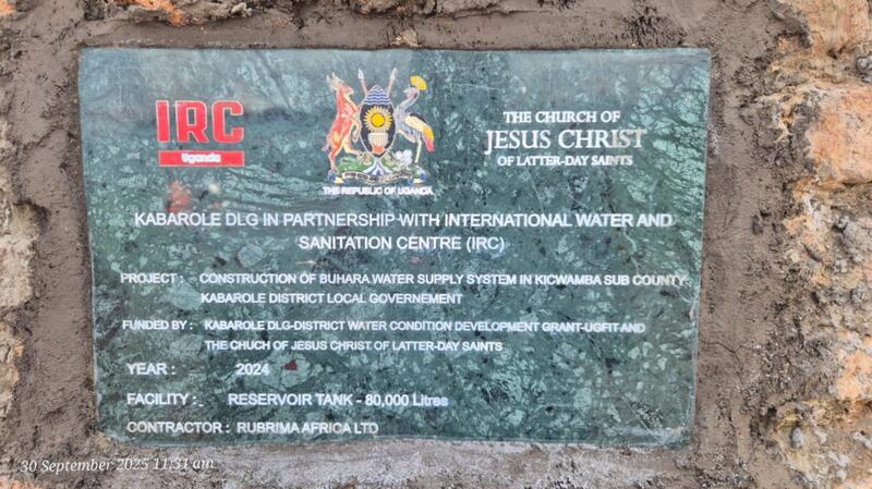 Plaque placed on newly constructed water tank in Magunga Hill, Bwanika Parish, Uganda, on Sept. 30, 2025.