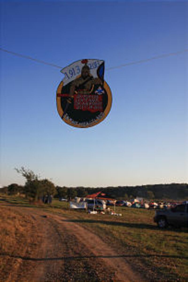 Motto, "Decisions Determine Destiny," is incorporated into logo at entrance to BSA encampment at Pdd