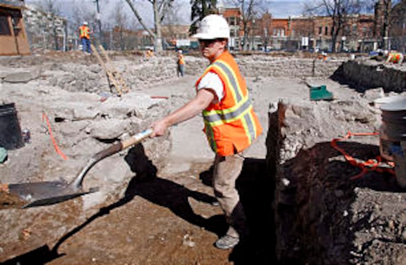 BYU graduate student Lindsay Johansson excavates what used to be the entrance to a staircase at the