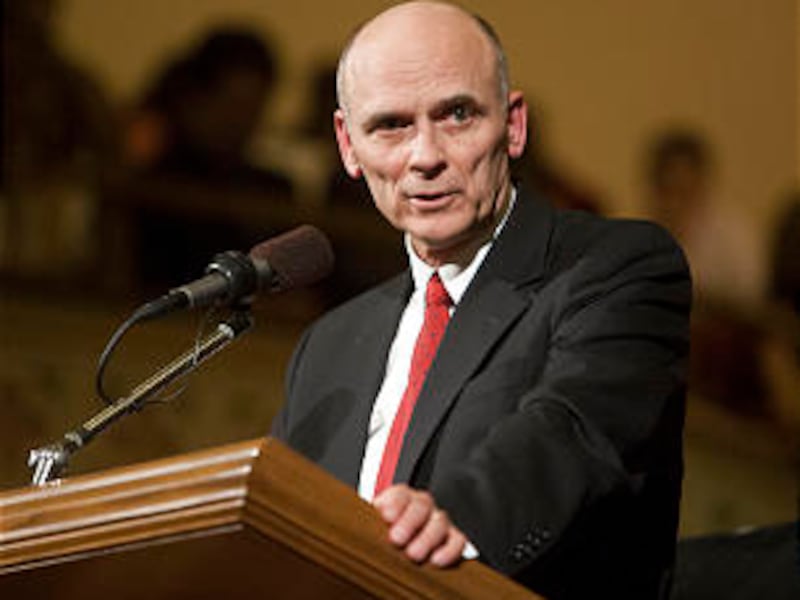 Elder C. Scott Grow addresses annual Thanksgiving Interfaith Service held in the Assembly Hall on Te