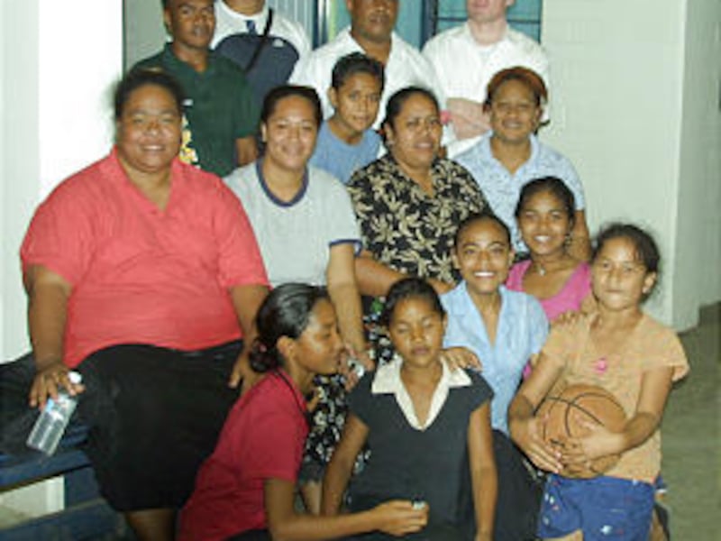 Members socialize in the plaza of the newly built Pago Pago Samoa Mapusaga stake center.