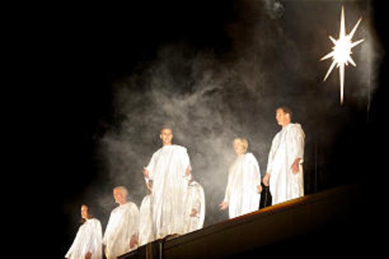 A choir, representing angels, stands in front of the star signifying the birth of the Savior. More t