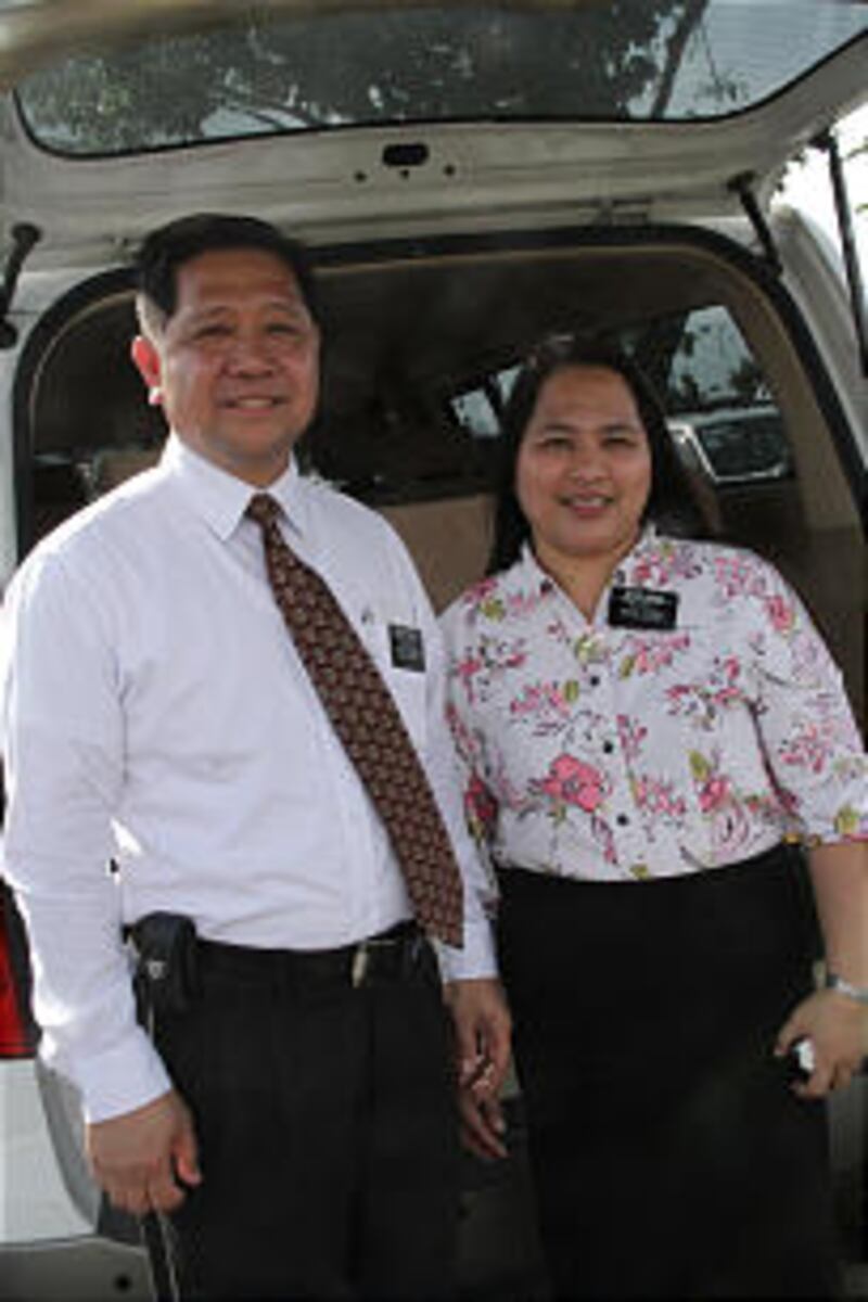 Philippines Tacloban Mission President Jose V. Andaya, with his wife, Yolanda Andaya, stand outside