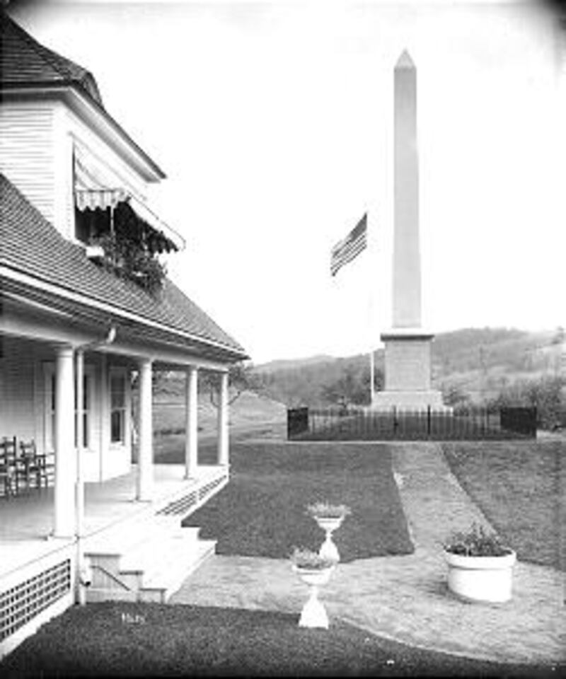 After locating the site of Joseph Smith's birth, Junius F. Wells erected 38 1/2-foot monument and bu