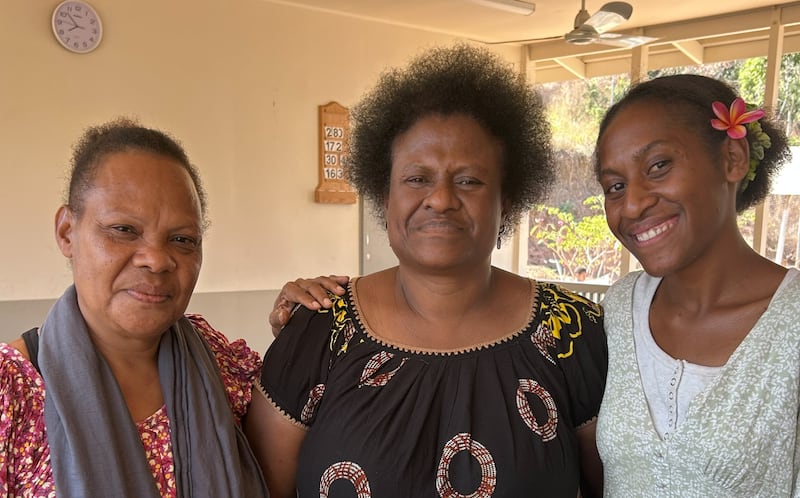 From left: Betty Aputa, Eight Mile Branch Relief Society first counselor; Rebecca Aga, Eight Mile Branch Relief Society president; and Kitana Teukari, a new convert, are photographed in July 2026.