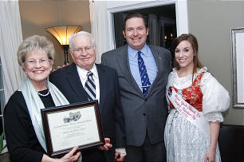 Barbara W. and Richard W. Winder display Czernin Palace Award presented by Jonathon Tichy, Czech hon