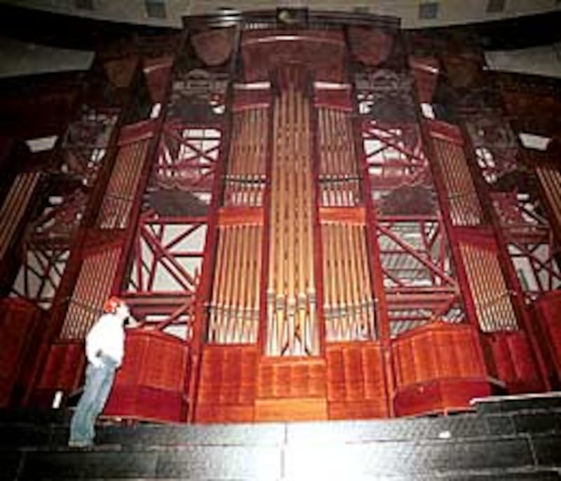 The appearance of the organ will be as dramatic as its sound. The case, together with the sweeping p