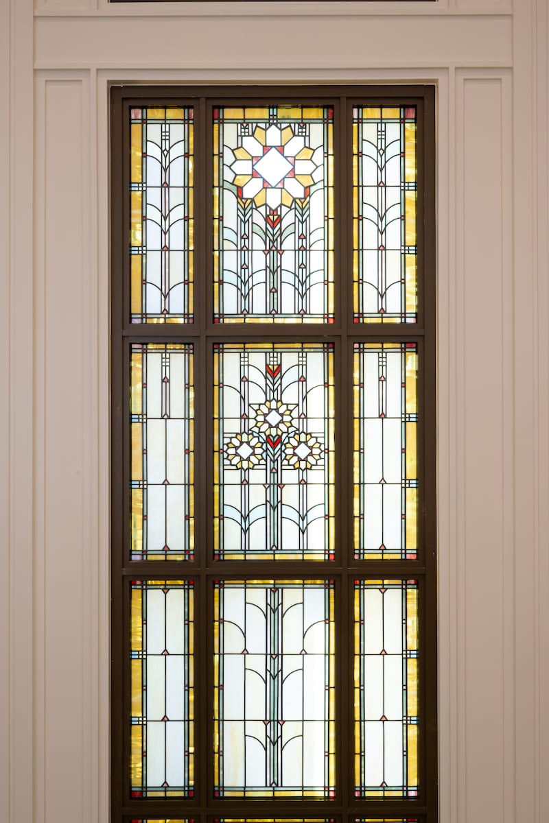 The design of the sunflower, the Kansas state flower, is displayed in art glass within the Wichita Kansas Temple.