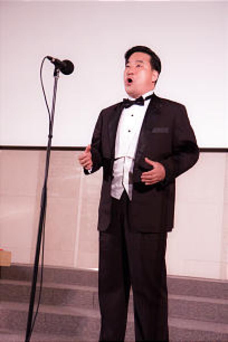 Baritone HaeKun Lee, counselor in the Seoul Mission Presidency, performs at the Korea Mission 50th a