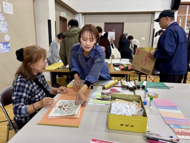 Participants create family history scrolls at a family history fair in Kyoto, Japan, Oct. 25, 2025.