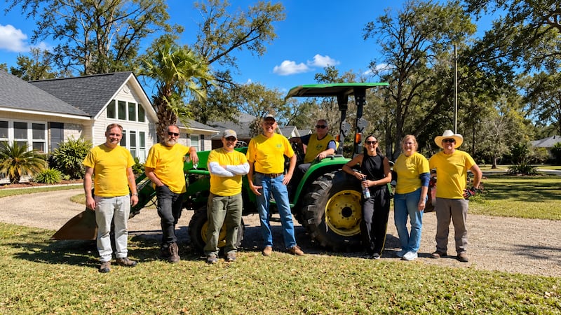 Latter-day Saint volunteers from the Tallahassee Florida Stake pause for a photo while cleaning up debris following Hurricane Isaias, in Pensacola, Florida, on Saturday, Oct. 17, 2026.