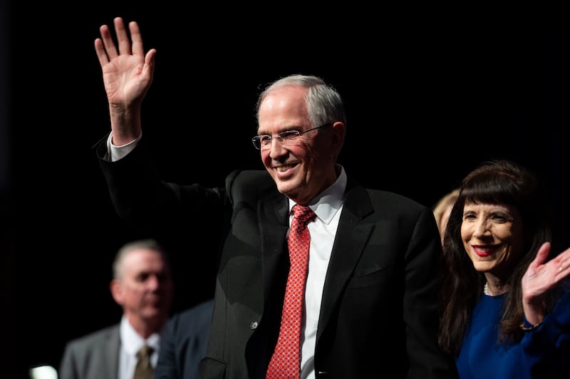 Elder Neil L. Andersen of the Quorum of the Twelve Apostles and his wife, Sister Kathy Andersen, wave as they enter the BYU–I Center during a devotional on Sunday, Feb. 22, 2026, in Rexburg, Idaho.