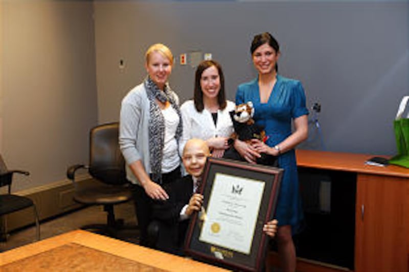 From left, Dr. Katie Gardner, Dr. Jane Hennessey and Dr. Amanda Murphy pose with honorary classmate