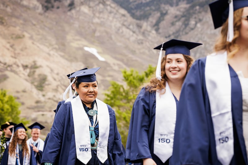 BYU graduates line up outside the Marriott Center in preparation for commencement on Thursday, April 23, 2026, in Provo, Utah.