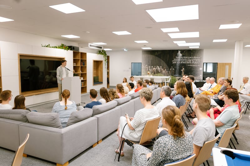 Lars Wiborny speaks to a group at the public open house of the Frankfurt Institute of Religion in Frankfurt, Germany, June 27, 2026.