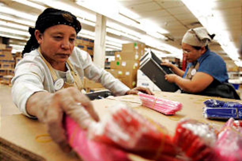 Workers at the LDS Humanitarian Center gather relief provisions to be sent to those in need followin