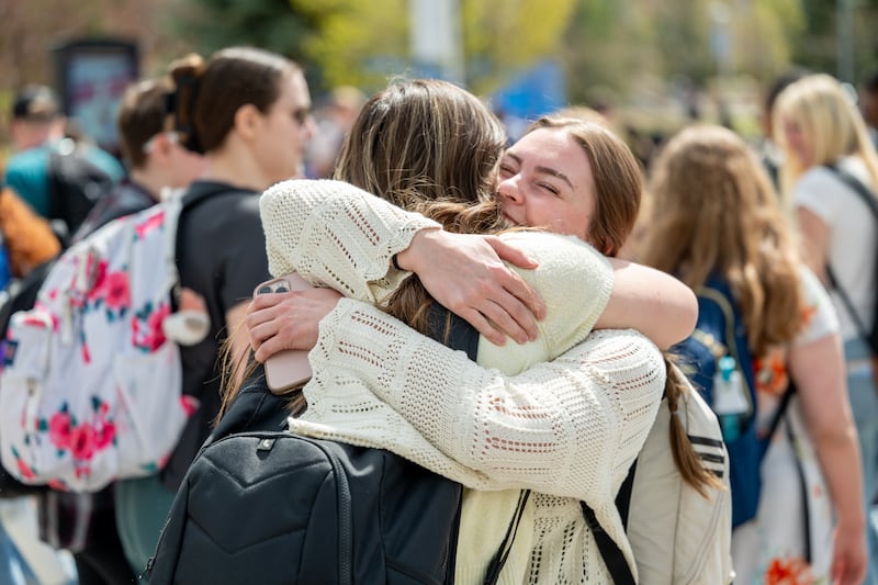 Brigham Young University–Idaho students embrace after a campus devotional with President Alvin F. Meredith III and his wife, Sister Jennifer Meredith, on Tuesday, April 21, 2026, in Rexburg, Idaho.