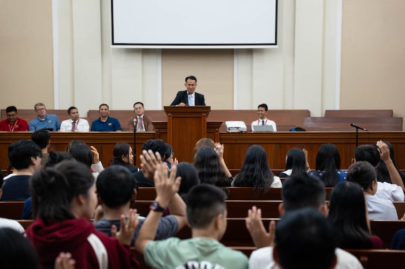 Phnom Penh Cambodia East District President Tay Sokha Phirum opens the Asia Area education fair in Phnom Penh with a spiritual thought on education, Oct. 18, 2025.