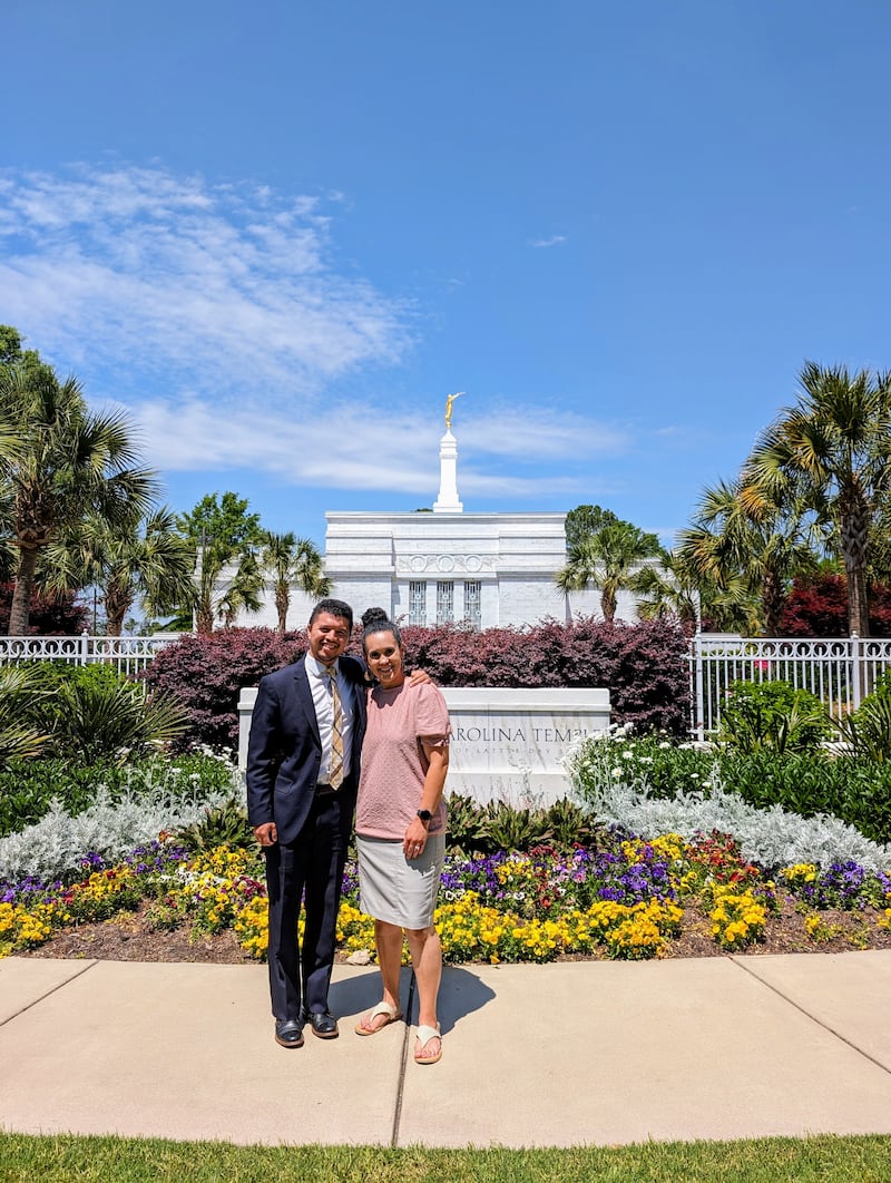 Vanessa Duerson and her husband Brian Kristofer Duerson stand outside the Columbia South Carolina Temple in Columbia, South Carolina, on April 24, 2024.