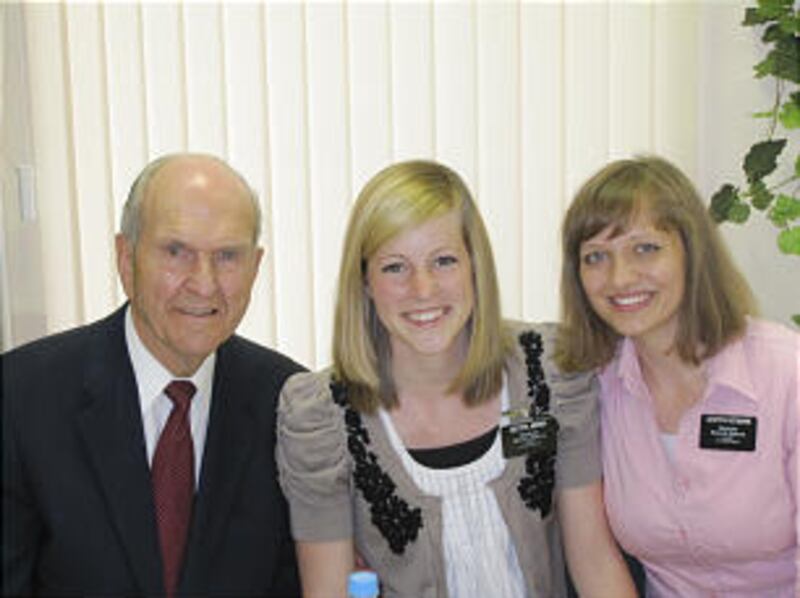 Elder Russell M. Nelson with his missionary granddaughter, Sister Lindsay Irion, center, and her com
