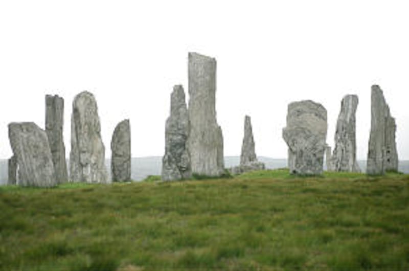 Callanish I, tall, silvery Lewisian gneiss stones positioned in circle and in rows and dating back t