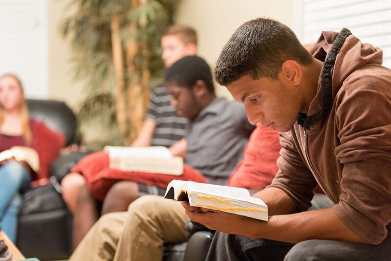 A group of youth in Florida reads scriptures together.