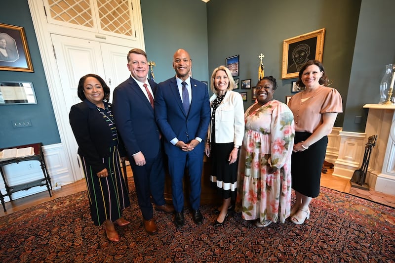 Lora Hargrove, Elder Michael P. Brady, Maryland Governor Wes Moore, President Camille N. Johnson, Sister Eme Martin and Bente Uhlig take a picture after meeting in the governor's office in Annapolis, Maryland, on Friday, May 15, 2026.