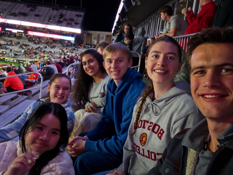 Five young single adults attend a Boston College football game together in Cambridge, Massachusetts, Oct. 11, 2025.