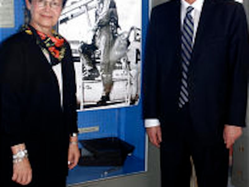 While touring Hangar 25 Museum, Pres. Uchtdorf and his wife, Harriet, find a photo of him taken at W