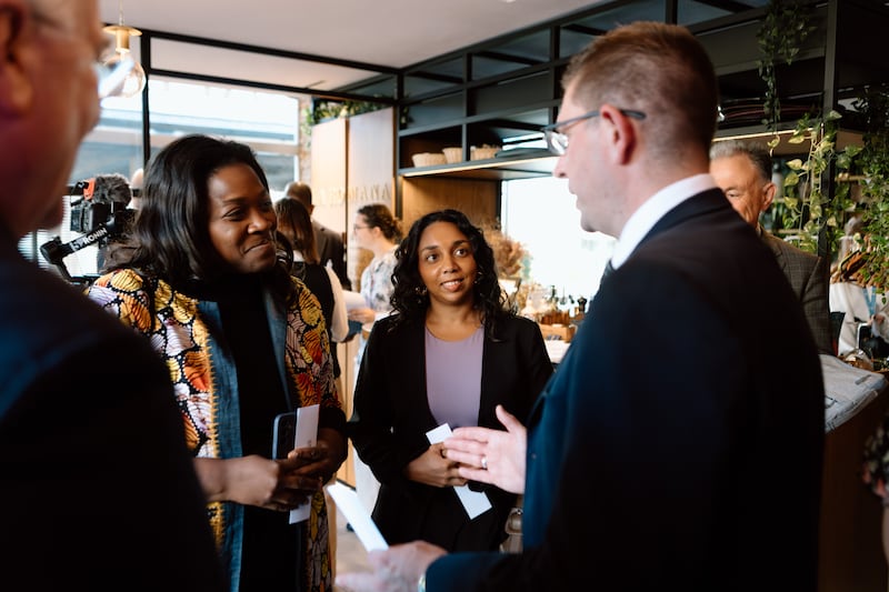 Stefano Bosco, director of Latter-day Saint Charities in Geneva, talks with Stephanie Dei and Shafa Maseeh from the International Organization for Migration (IOM) in Geneva, Switzerland, on Wednesday, April 15, 2026.