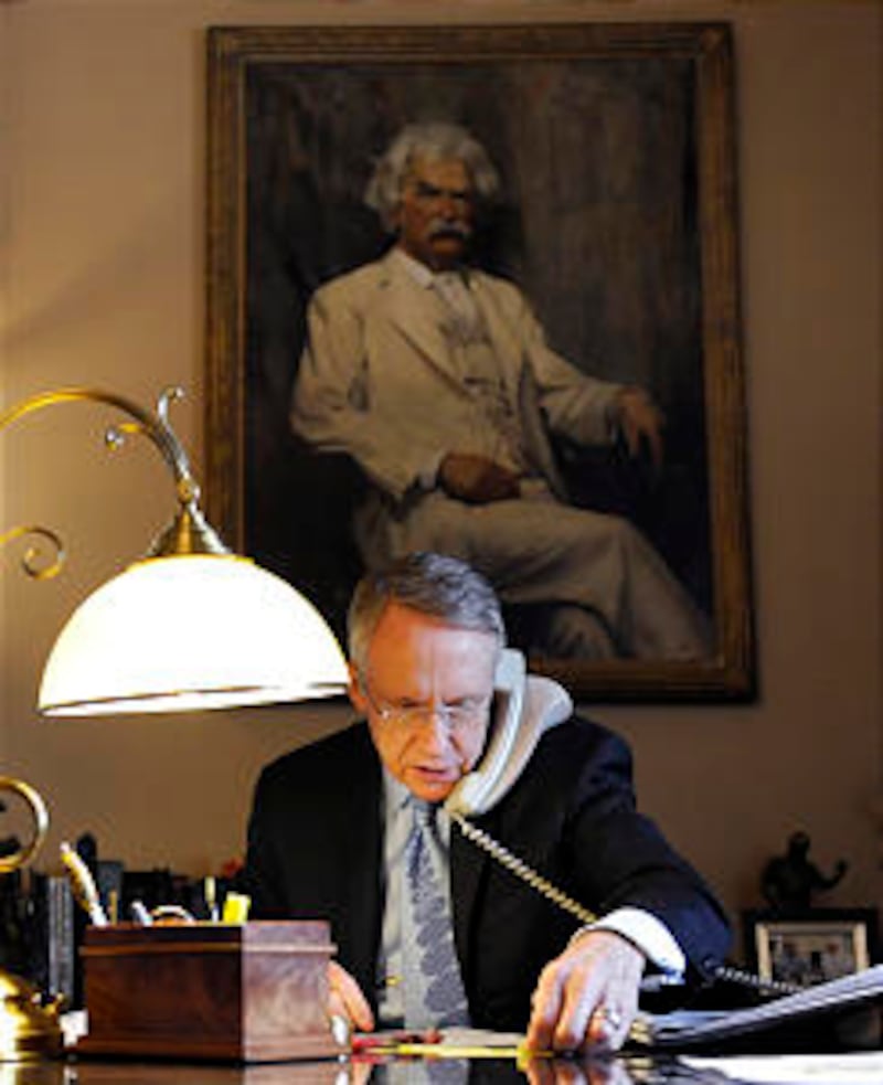 Senate Majority Leader Harry Reid of Nev. works the phones from his office on Capitol Hill in Washin