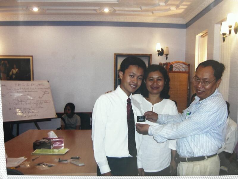 Sam Sophon and Chan Sovan celebrate the return of their third child from his full-time mission.