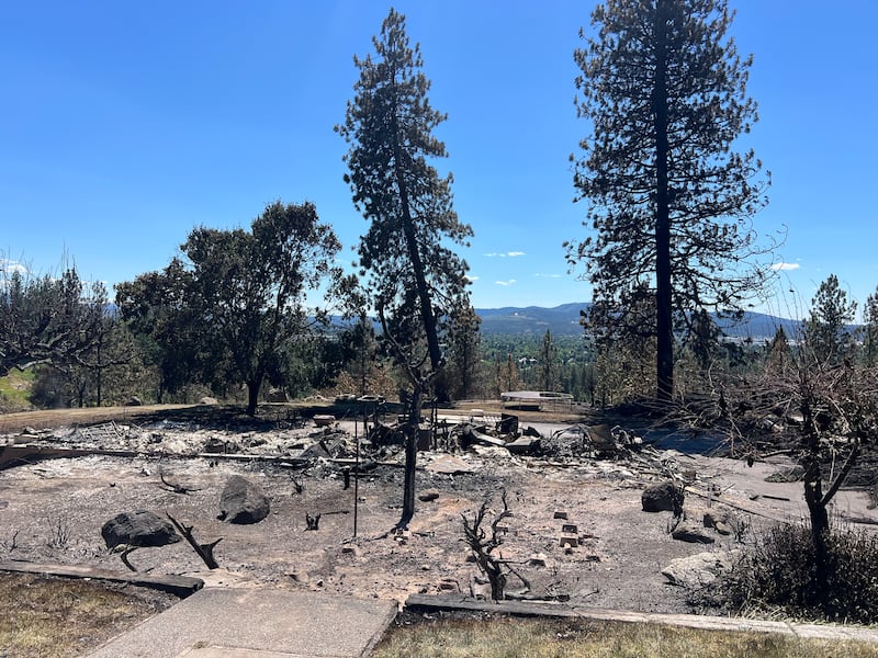 The view from the front of the property where the Anglesey family's home once stood before the Upriver Fire in Spokane, Washington, swept through on Tuesday, June 16, 2026.
