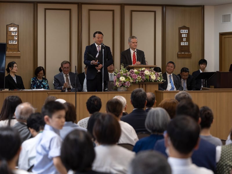 Elder David A. Bednar of the Quorum of the Twelve Apostles speaks at a meeting celebrating the 125th anniversary of The Church of Jesus Christ of Latter-day Saints in Japan, in Yamate, Yokohama, on Aug. 30, 2026.