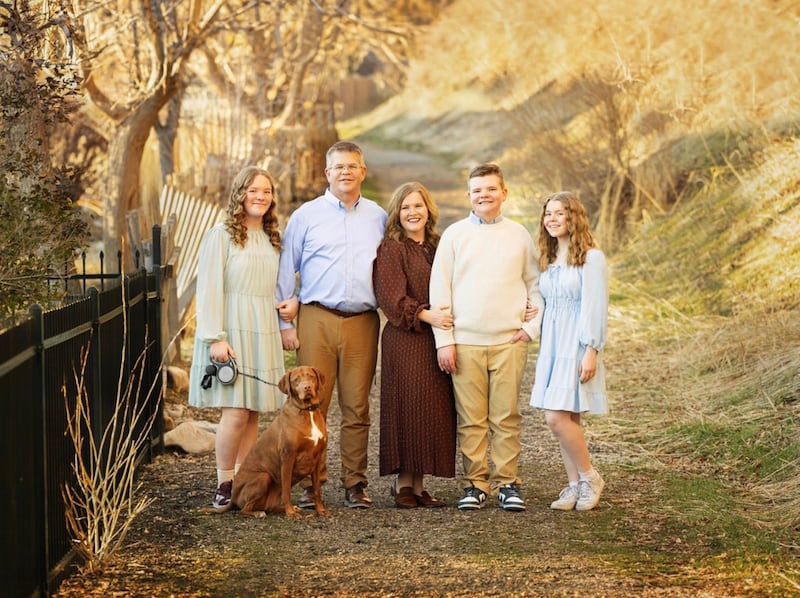 Katie Edna Steed — the Church's disability specialist manager, center — poses for a photo with her family in Provo, Utah, October 2024.