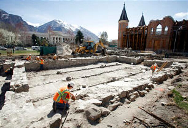Workers uncover the original foundation for Provo's first tabernacle, a building known as the origin