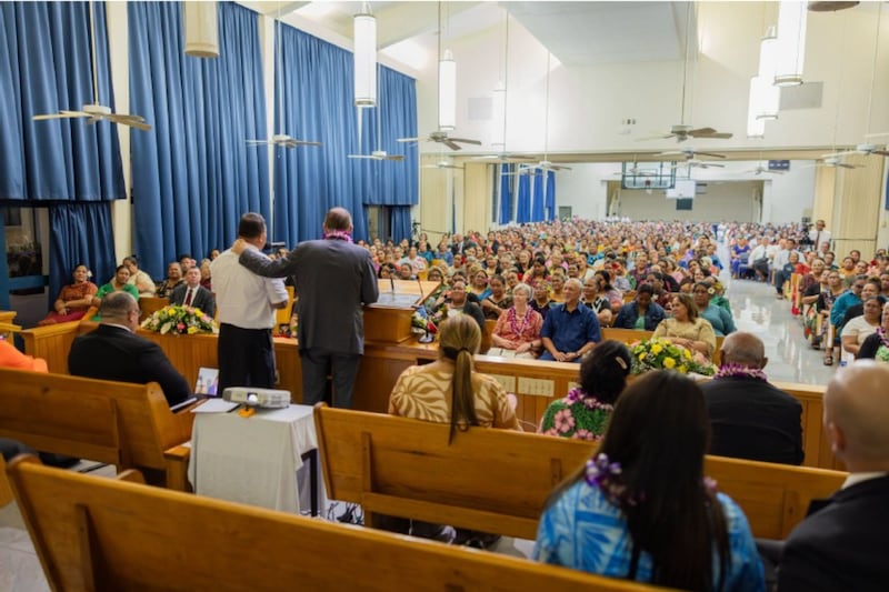 Elder Gary E. Stevenson of the Quorum of the Twelve Apostles speaks during a devotional for women and girls in Apia, Samoa, on May 23, 2026.