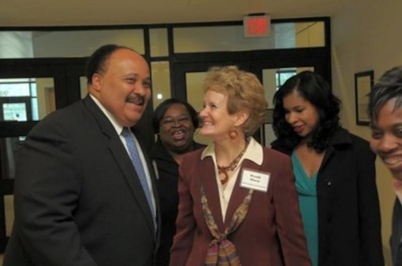 Atlanta Public Affairs Director Wendy Sharp greets Martin Luther King III and his wife, Arndrea, bac