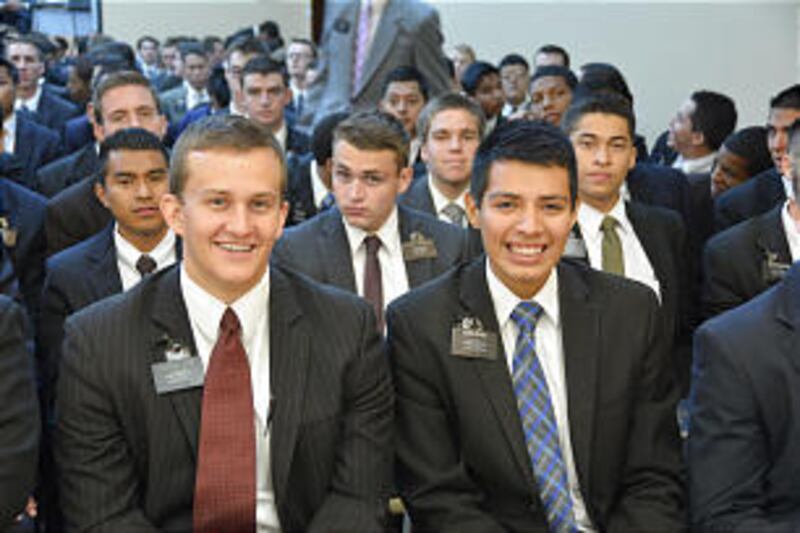 Missionaries from the Missionary Training Center in Guatemala City, Guatemala, assemble to listen to