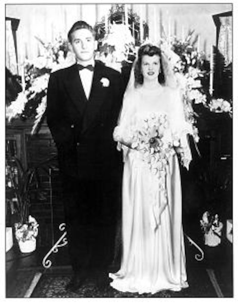 Newlyweds Tom and Frances Monson at their wedding reception.