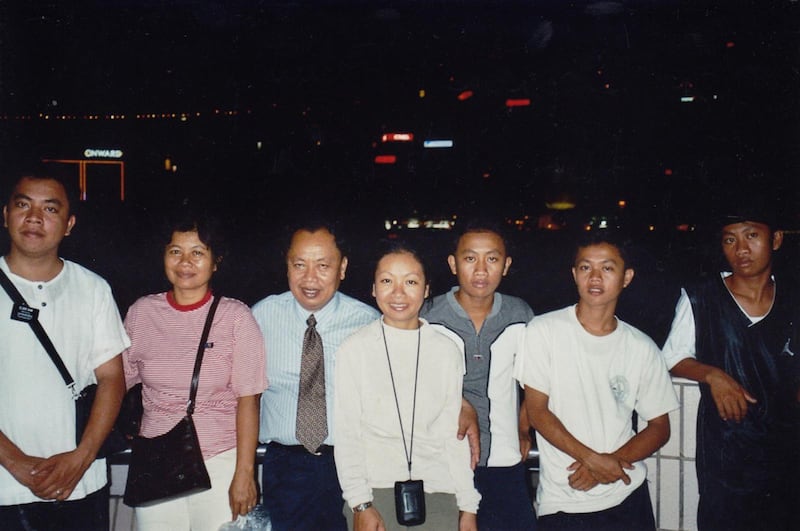 Sam Sophon, Chan Sovan and their five children pose for a photo while visiting Hong Kong in August 2004 for their sealing.