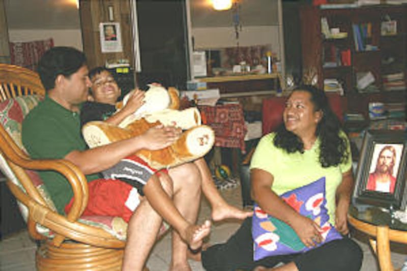 Iotua Brothers, Arue Tahiti Stake patriarch, and his wife, Amelie, have served the Church in Tahiti.
