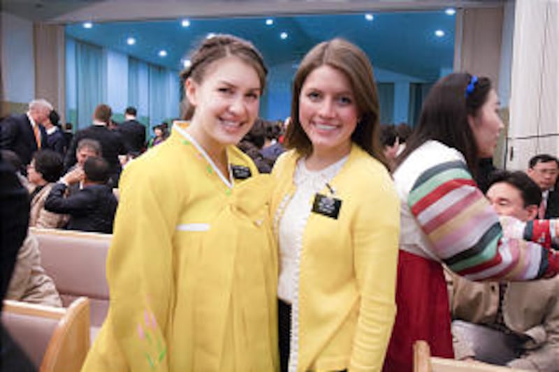 Seoul Sister Missionaries usher at the Korea Mission 50th anniversary celebration, Nov. 18, 2012.