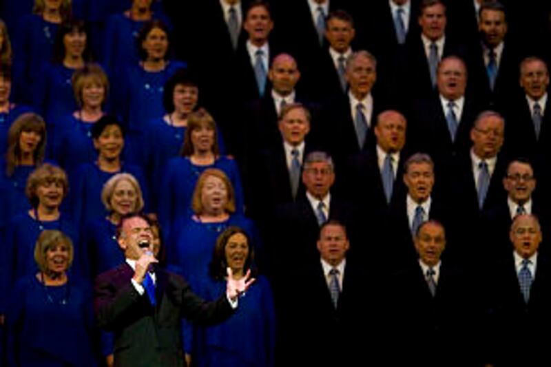 Performer Brian Stokes Mitchell sings with the Mormon Tabernacle Choir at the Pioneer Day Commemorat